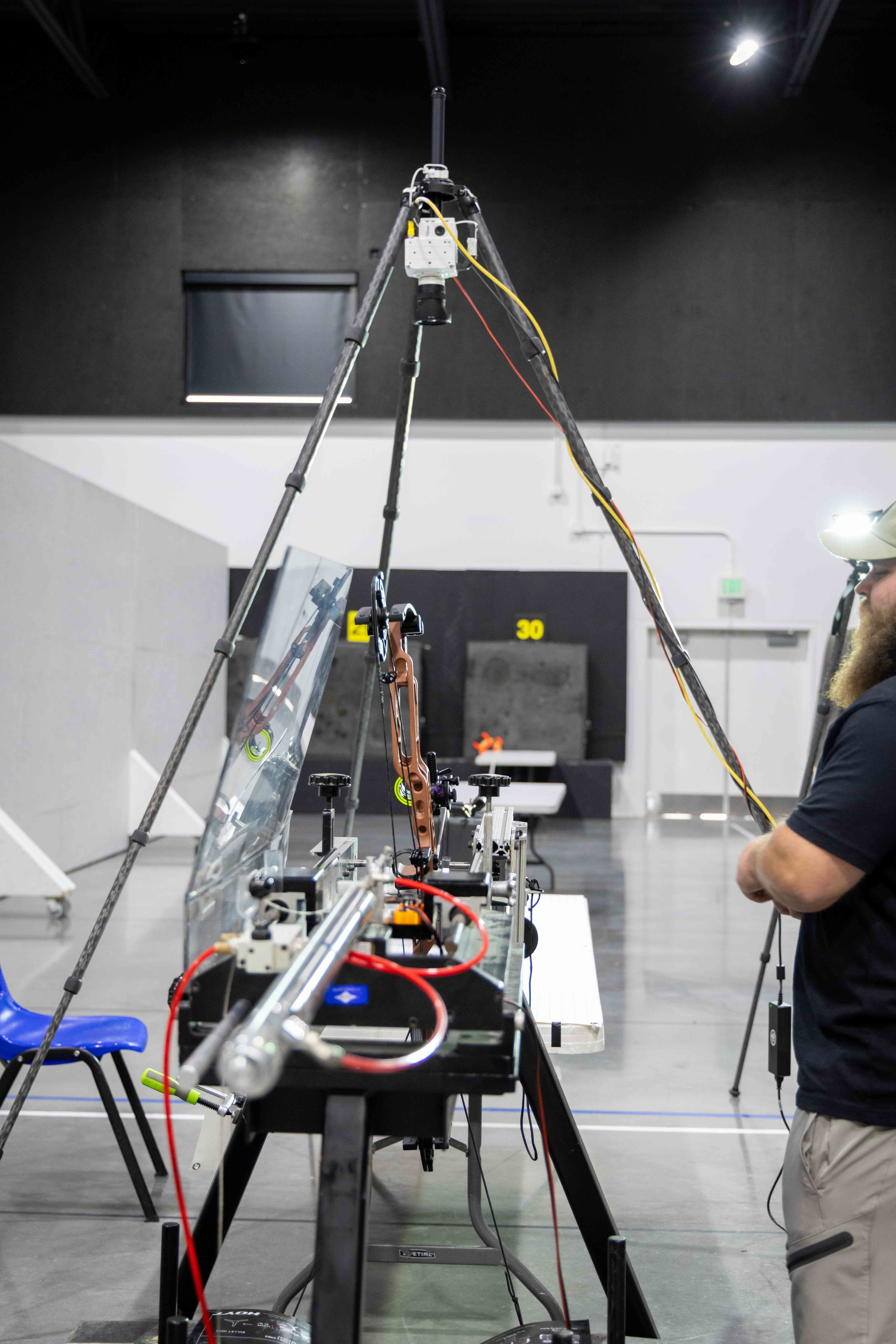 Calibration camera mounted on tripod above the shooting rig