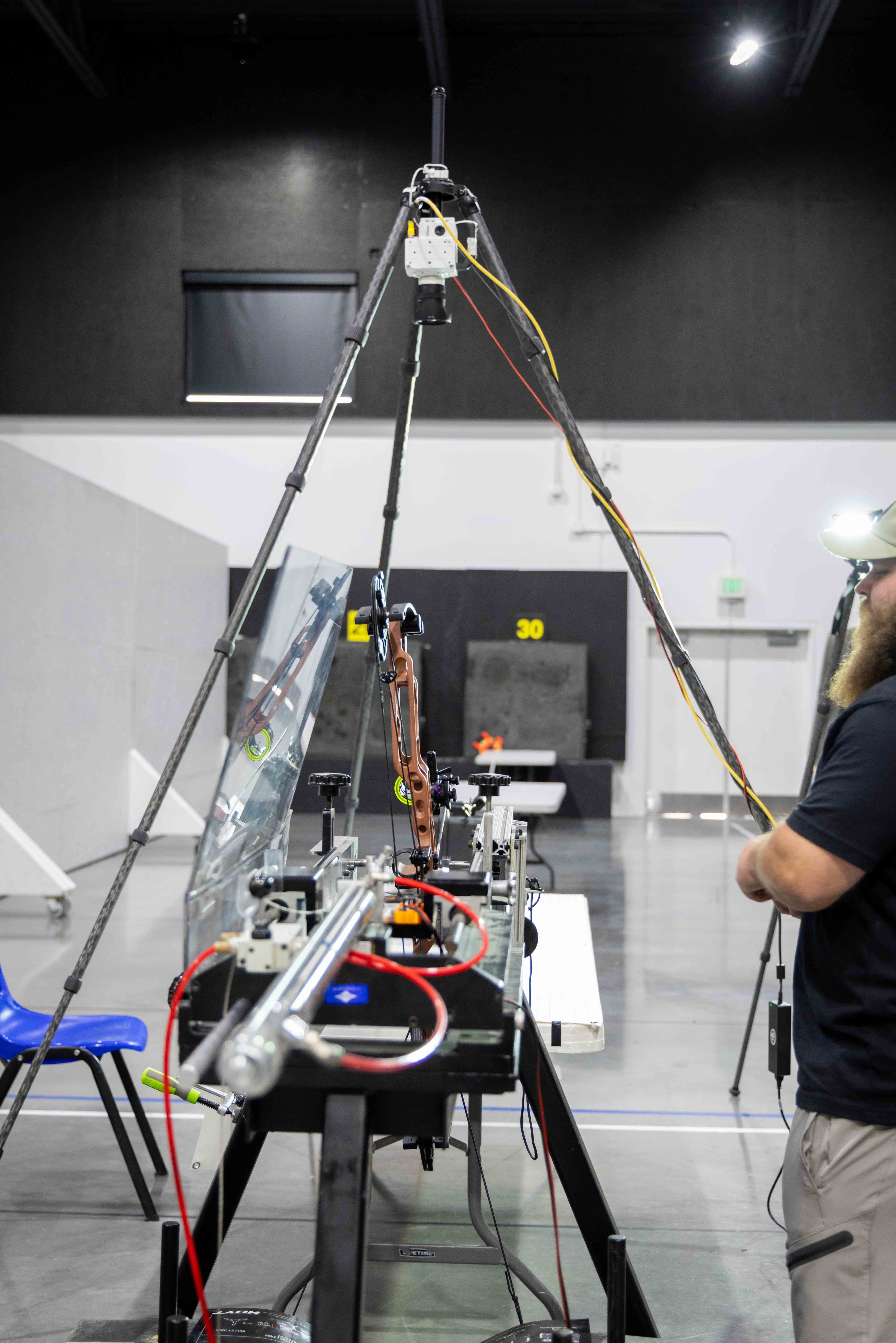 Calibration camera mounted on tripod above the shooting rig
