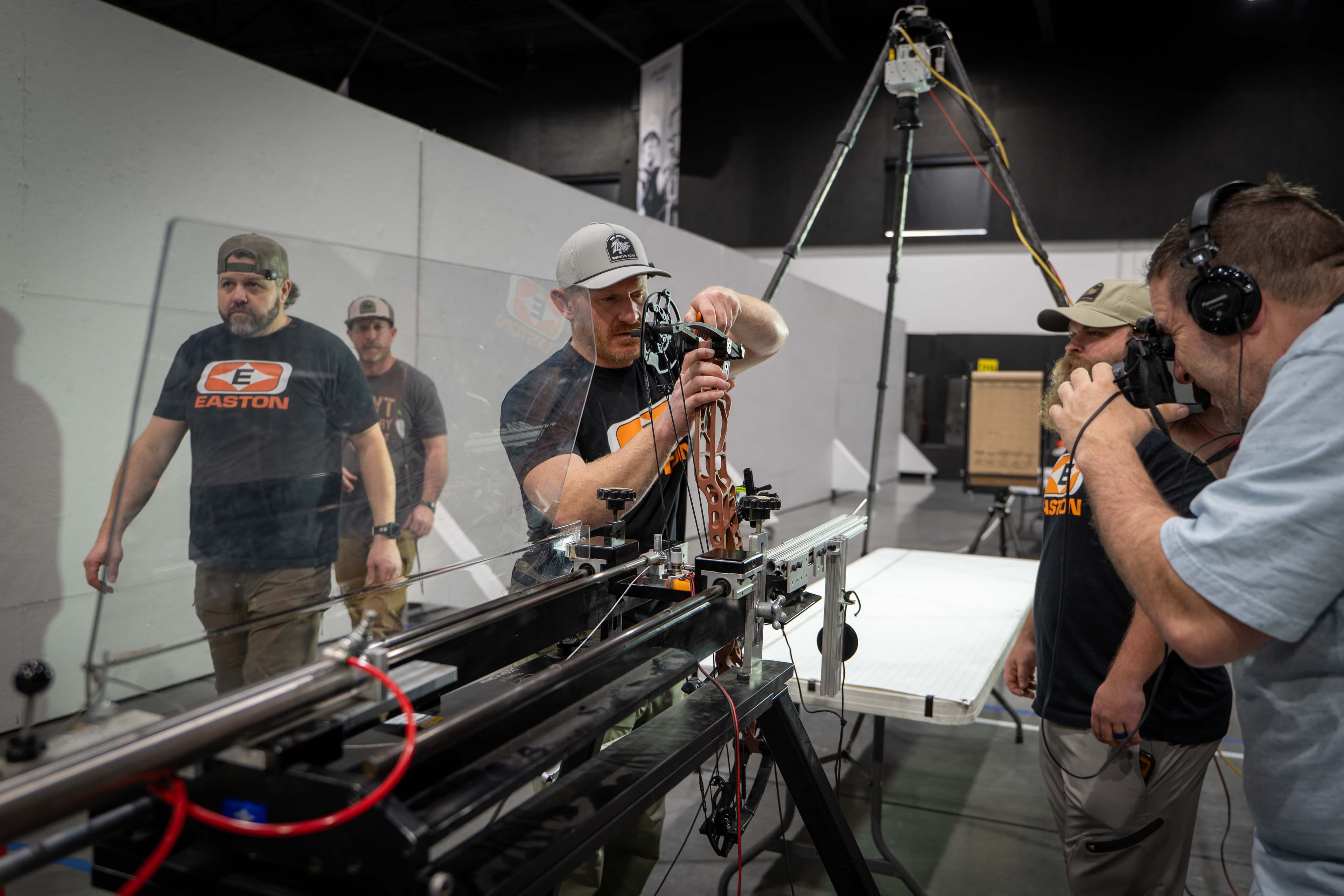 Team setting up a fresh broadhead build at the rig